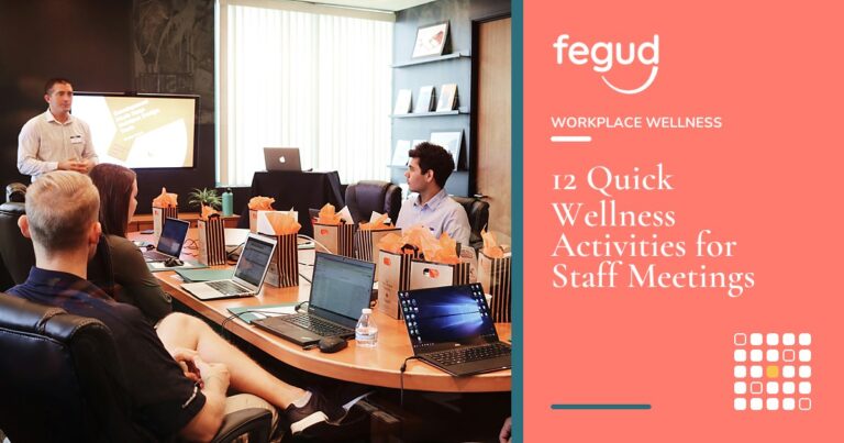 Team members at a presentation using wellness activities for staff meetings