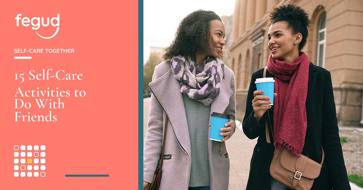 Two friends walking outdoors while planning self-care activities with friends