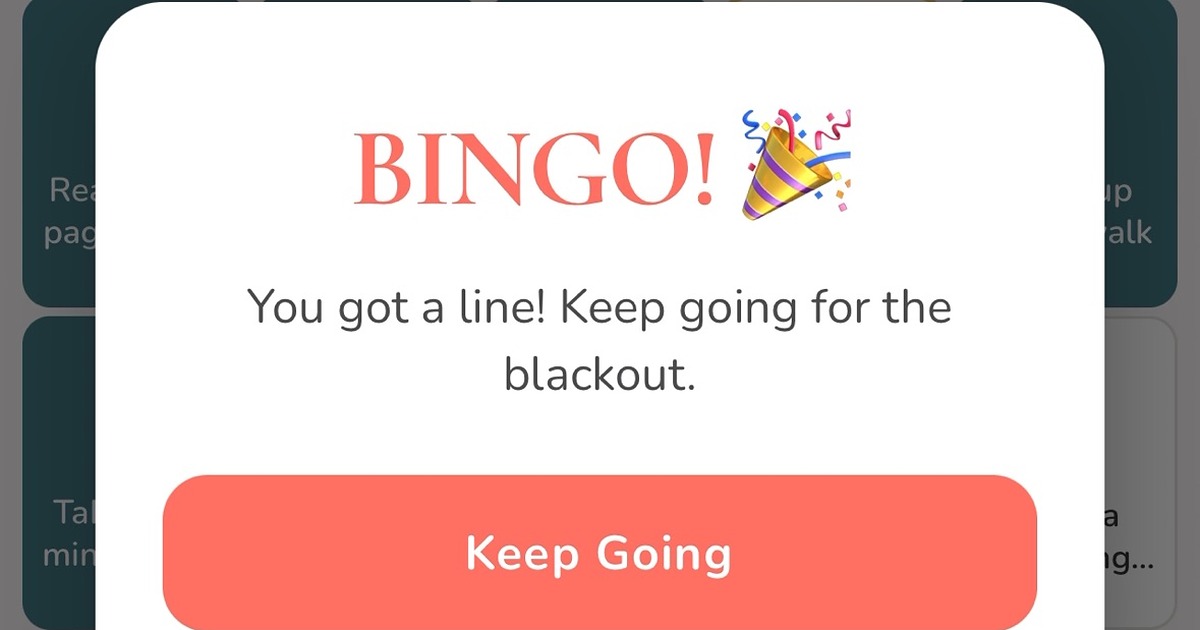 Fegud self-care bingo app showing a completed line and Keep Going prompt