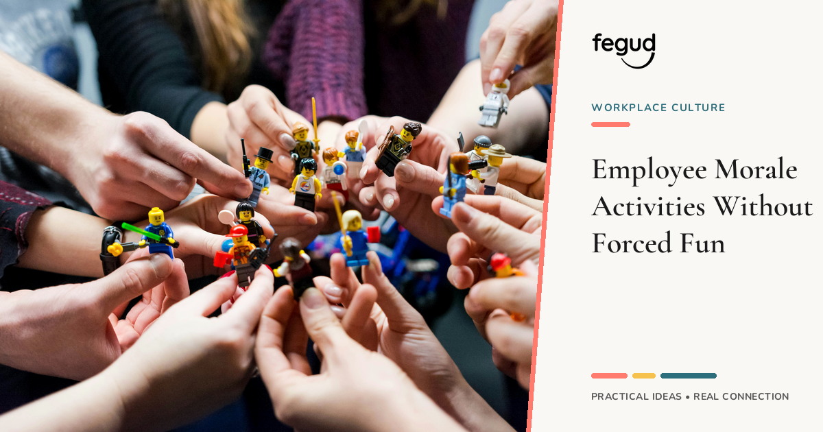 Coworkers building with colorful figures during optional employee morale activities