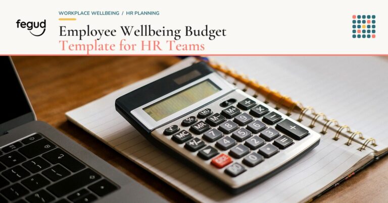 Laptop, calculator, and spreadsheet used to plan an employee wellbeing budget