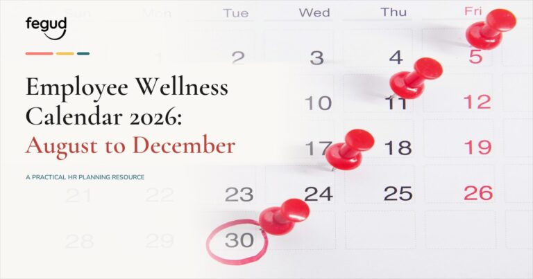 Employee wellness calendar 2026 planning guide pinned beside a monthly schedule