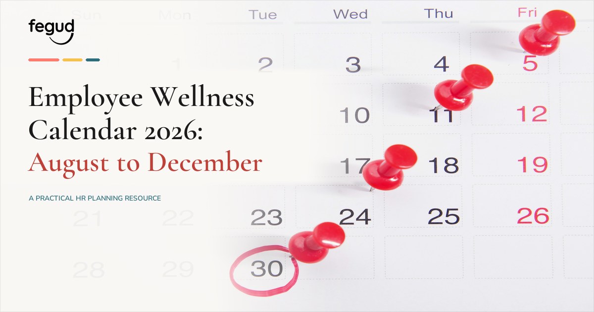 Employee wellness calendar 2026 planning guide pinned beside a monthly schedule