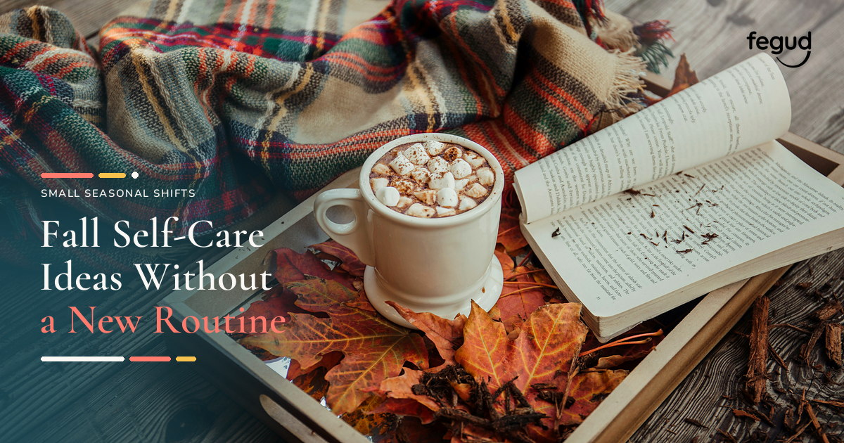 Hot drink, open book, and blanket beside a list of fall self-care ideas