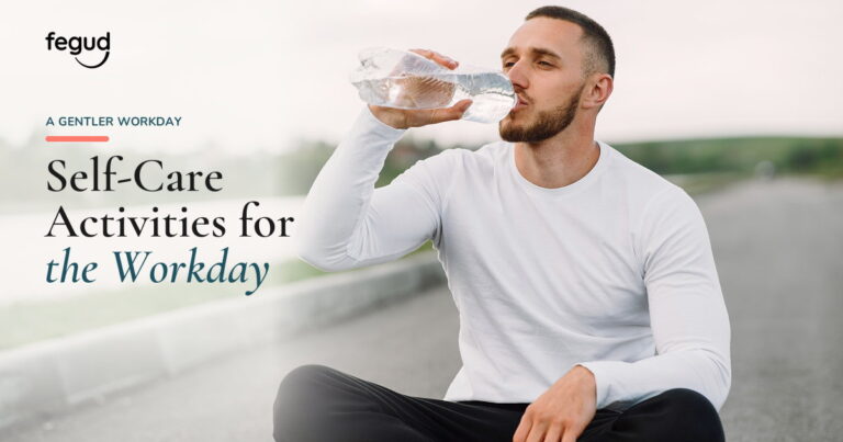 Man drinking water outdoors while trying self-care activities at work