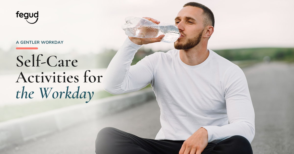 Man drinking water outdoors while trying self-care activities at work