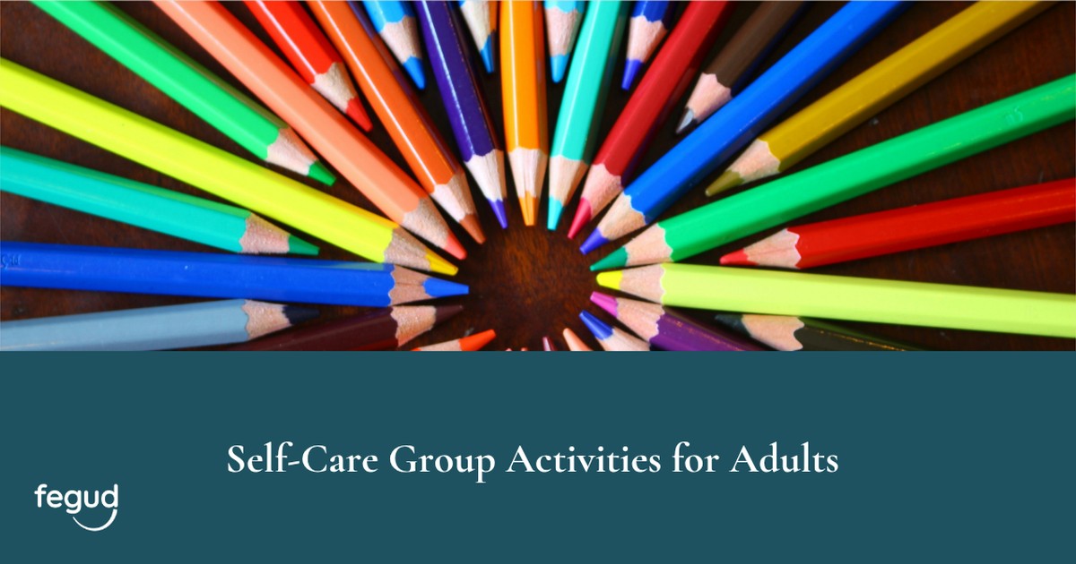 Colorful pencils in a circle for group self-care activities for adults